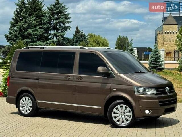Коричневий Фольксваген Мультиван, об'ємом двигуна 2 л та пробігом 124 тис. км за 33800 $, фото 2 на Automoto.ua