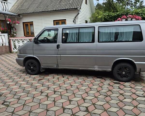 Сірий Фольксваген Мультиван, об'ємом двигуна 2.5 л та пробігом 410 тис. км за 7600 $, фото 4 на Automoto.ua