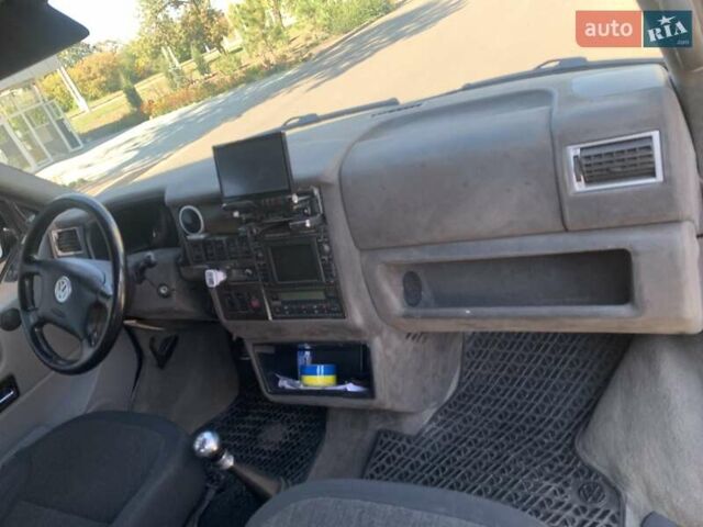 Сірий Фольксваген Мультиван, об'ємом двигуна 2.46 л та пробігом 210 тис. км за 13700 $, фото 17 на Automoto.ua