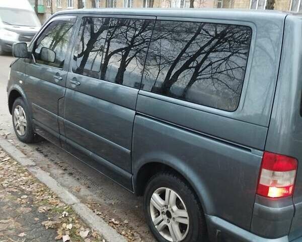 Серый Фольксваген Мультиван, объемом двигателя 2.46 л и пробегом 390 тыс. км за 11500 $, фото 11 на Automoto.ua