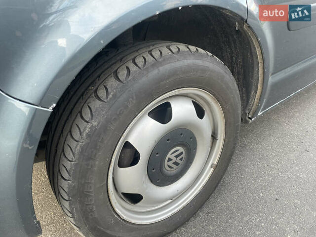 Сірий Фольксваген Мультиван, об'ємом двигуна 2.46 л та пробігом 257 тис. км за 12900 $, фото 4 на Automoto.ua