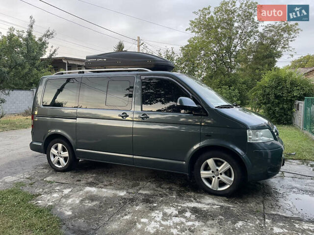Сірий Фольксваген Мультиван, об'ємом двигуна 2.46 л та пробігом 330 тис. км за 18500 $, фото 2 на Automoto.ua