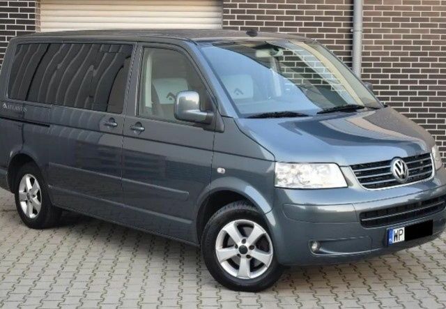 Сірий Фольксваген Мультиван, об'ємом двигуна 2.5 л та пробігом 230 тис. км за 7900 $, фото 2 на Automoto.ua