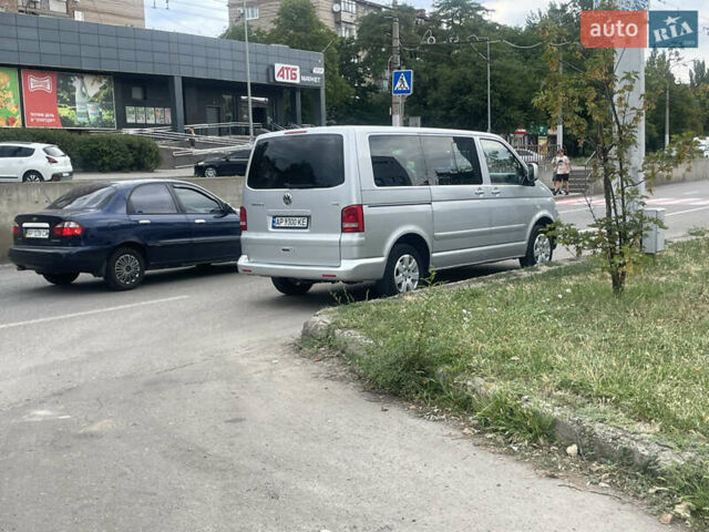 Сірий Фольксваген Мультиван, об'ємом двигуна 2.46 л та пробігом 294 тис. км за 11000 $, фото 4 на Automoto.ua