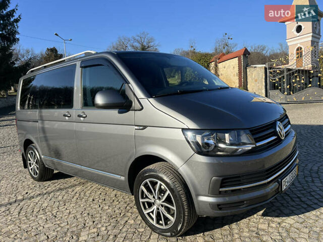Серый Фольксваген Мультиван, объемом двигателя 2 л и пробегом 209 тыс. км за 27900 $, фото 1 на Automoto.ua