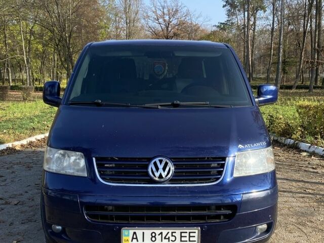 Синий Фольксваген Мультиван, объемом двигателя 2.5 л и пробегом 258 тыс. км за 13500 $, фото 2 на Automoto.ua