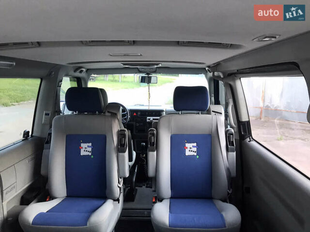 Синий Фольксваген Мультиван, объемом двигателя 2.5 л и пробегом 273 тыс. км за 13000 $, фото 6 на Automoto.ua