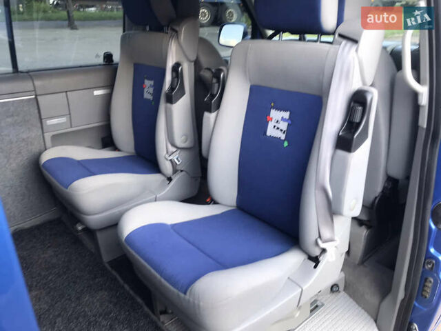 Синий Фольксваген Мультиван, объемом двигателя 2.5 л и пробегом 273 тыс. км за 13000 $, фото 11 на Automoto.ua