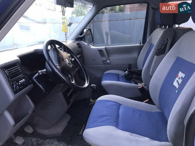 Синий Фольксваген Мультиван, объемом двигателя 2.5 л и пробегом 273 тыс. км за 13000 $, фото 19 на Automoto.ua