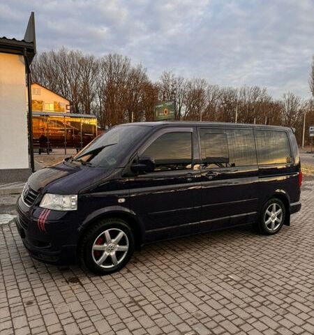 Синий Фольксваген Мультиван, объемом двигателя 2.5 л и пробегом 318 тыс. км за 13800 $, фото 3 на Automoto.ua