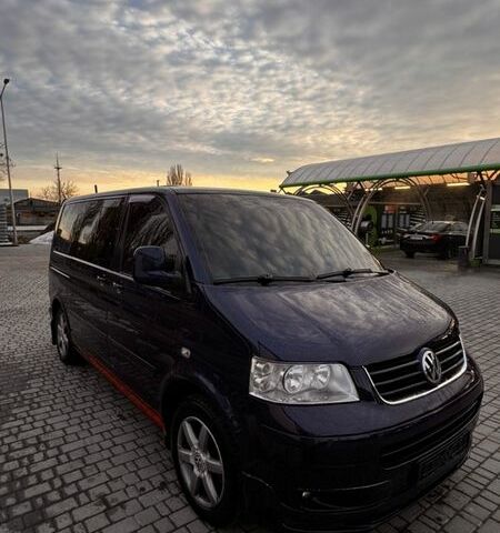 Синий Фольксваген Мультиван, объемом двигателя 2.5 л и пробегом 318 тыс. км за 13800 $, фото 1 на Automoto.ua