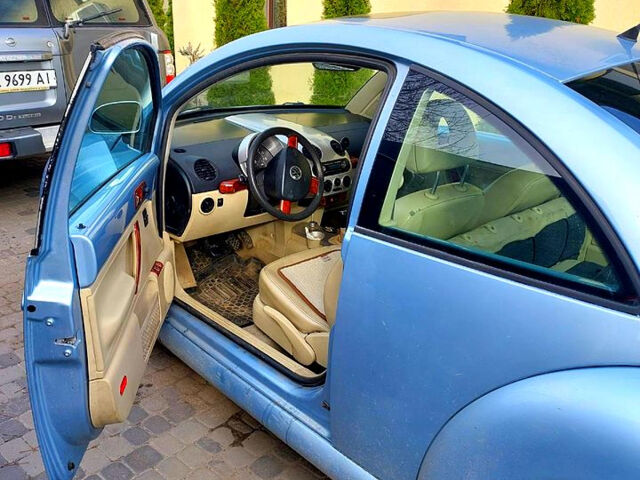 Синій Фольксваген Нью Бітл, об'ємом двигуна 2 л та пробігом 221 тис. км за 4500 $, фото 2 на Automoto.ua