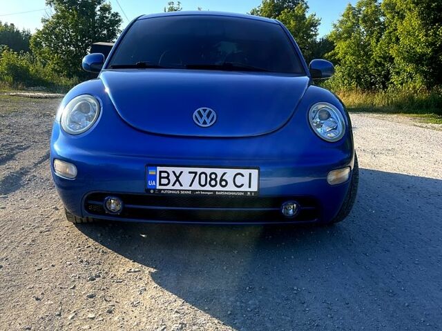 Синий Фольксваген Нью Битл, объемом двигателя 2 л и пробегом 168 тыс. км за 4900 $, фото 4 на Automoto.ua