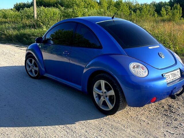 Синий Фольксваген Нью Битл, объемом двигателя 2 л и пробегом 168 тыс. км за 4900 $, фото 3 на Automoto.ua