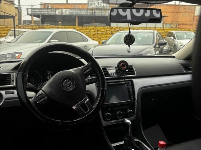 Черный Фольксваген Пассат Б7, объемом двигателя 2.5 л и пробегом 246 тыс. км за 9690 $, фото 14 на Automoto.ua