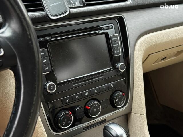 Черный Фольксваген Пассат Б7, объемом двигателя 1.8 л и пробегом 140 тыс. км за 10990 $, фото 22 на Automoto.ua