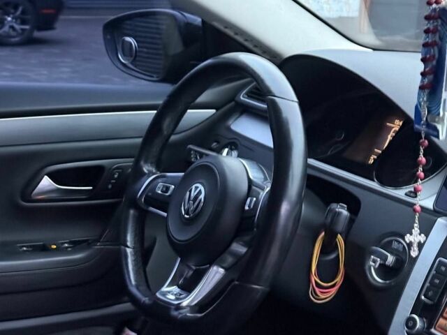 Черный Фольксваген Пассат СС, объемом двигателя 2 л и пробегом 271 тыс. км за 15000 $, фото 1 на Automoto.ua