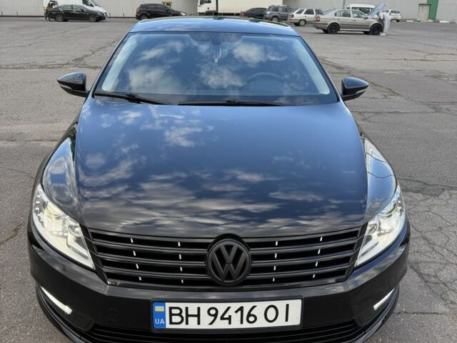 Черный Фольксваген Пассат СС, объемом двигателя 2 л и пробегом 213 тыс. км за 12000 $, фото 1 на Automoto.ua