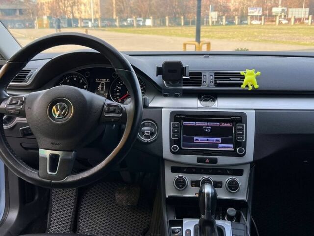 Синий Фольксваген Пассат СС, объемом двигателя 2 л и пробегом 143 тыс. км за 11200 $, фото 3 на Automoto.ua