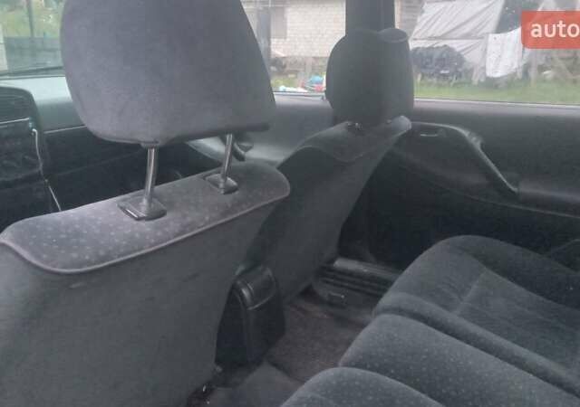 Черный Фольксваген Пассат, объемом двигателя 2 л и пробегом 290 тыс. км за 1300 $, фото 1 на Automoto.ua