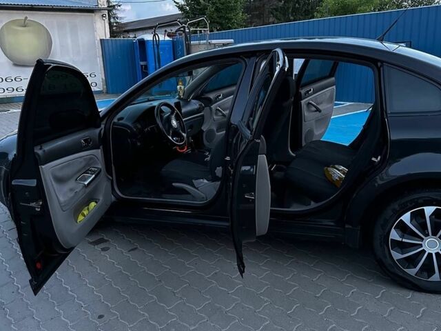 Черный Фольксваген Пассат, объемом двигателя 1.8 л и пробегом 340 тыс. км за 3200 $, фото 6 на Automoto.ua