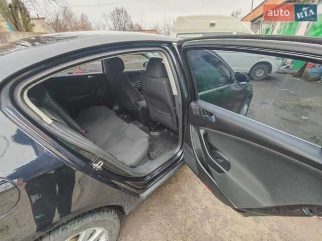 Чорний Фольксваген Пассат, об'ємом двигуна 2 л та пробігом 112 тис. км за 6950 $, фото 36 на Automoto.ua