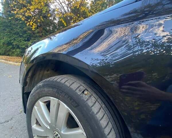 Черный Фольксваген Пассат, объемом двигателя 1.97 л и пробегом 256 тыс. км за 6500 $, фото 29 на Automoto.ua