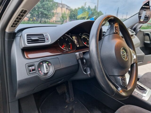 Чорний Фольксваген Пассат, об'ємом двигуна 2 л та пробігом 170 тис. км за 10999 $, фото 8 на Automoto.ua