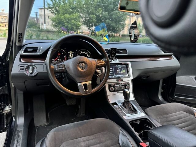 Чорний Фольксваген Пассат, об'ємом двигуна 2 л та пробігом 170 тис. км за 10999 $, фото 12 на Automoto.ua