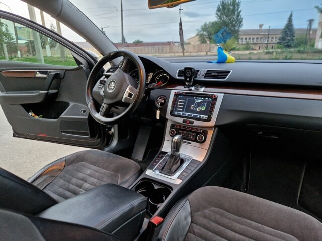 Чорний Фольксваген Пассат, об'ємом двигуна 2 л та пробігом 170 тис. км за 10999 $, фото 7 на Automoto.ua