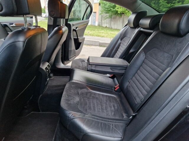 Чорний Фольксваген Пассат, об'ємом двигуна 2 л та пробігом 170 тис. км за 10999 $, фото 9 на Automoto.ua