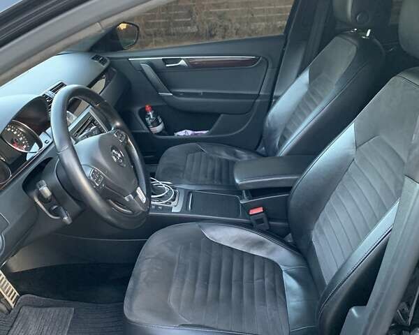 Черный Фольксваген Пассат, объемом двигателя 1.97 л и пробегом 300 тыс. км за 12000 $, фото 2 на Automoto.ua