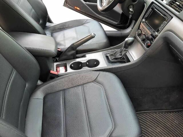 Чорний Фольксваген Пассат, об'ємом двигуна 2 л та пробігом 300 тис. км за 9499 $, фото 16 на Automoto.ua