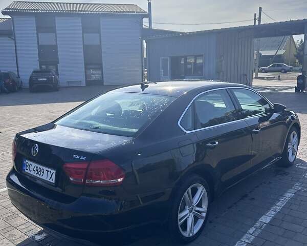 Чорний Фольксваген Пассат, об'ємом двигуна 2 л та пробігом 150 тис. км за 12500 $, фото 1 на Automoto.ua