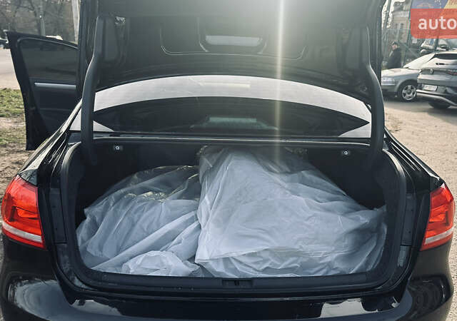 Черный Фольксваген Пассат, объемом двигателя 1.8 л и пробегом 103 тыс. км за 10999 $, фото 23 на Automoto.ua