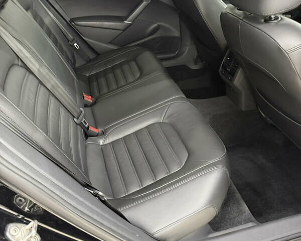 Черный Фольксваген Пассат, объемом двигателя 1.8 л и пробегом 149 тыс. км за 14500 $, фото 23 на Automoto.ua