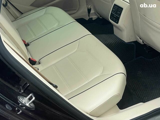 Чорний Фольксваген Пассат, об'ємом двигуна 2 л та пробігом 162 тис. км за 13790 $, фото 26 на Automoto.ua