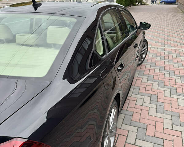 Черный Фольксваген Пассат, объемом двигателя 1.98 л и пробегом 25 тыс. км за 16399 $, фото 11 на Automoto.ua