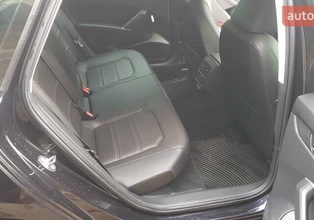 Чорний Фольксваген Пассат, об'ємом двигуна 2 л та пробігом 76 тис. км за 19499 $, фото 23 на Automoto.ua