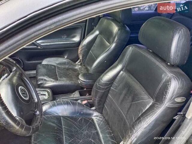 Черный Фольксваген Пассат, объемом двигателя 2.77 л и пробегом 267 тыс. км за 2950 $, фото 6 на Automoto.ua
