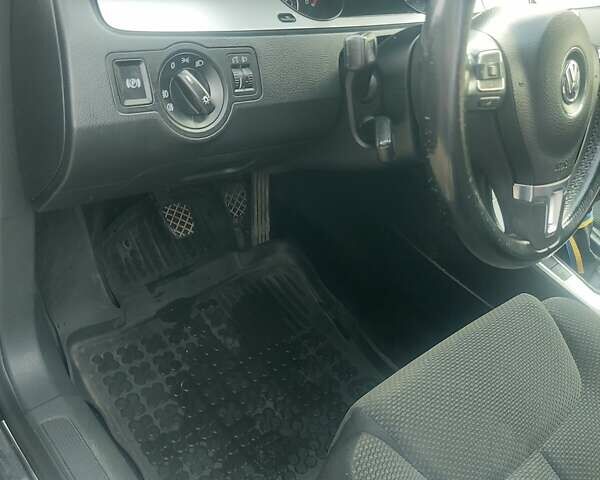 Фольксваген Пассат 2010 в Житомире на Automoto.ua Черный Фольксваген Пассат, объемом двигателя 1.97 л и пробегом 220 тыс. км за 8000 $, фото 11 на Automoto.ua