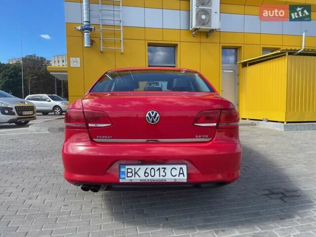 Красный Фольксваген Пассат, объемом двигателя 2 л и пробегом 169 тыс. км за 10000 $, фото 1 на Automoto.ua