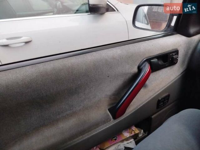 Красный Фольксваген Пассат, объемом двигателя 2 л и пробегом 440 тыс. км за 1900 $, фото 7 на Automoto.ua