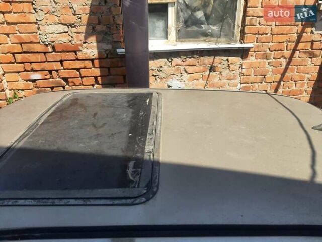 Серый Фольксваген Пассат, объемом двигателя 1.8 л и пробегом 220 тыс. км за 600 $, фото 1 на Automoto.ua