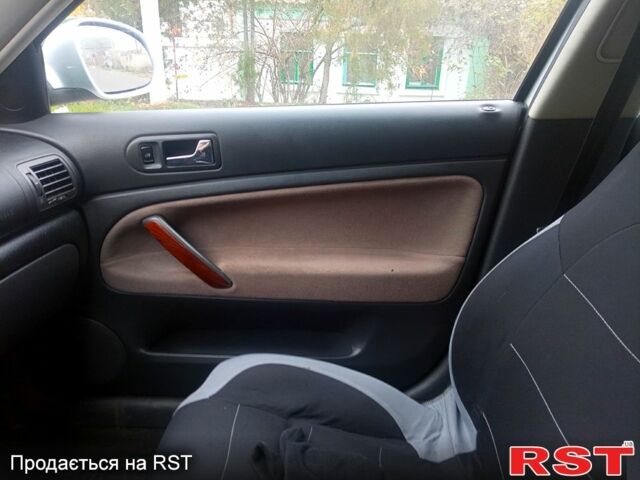 Серый Фольксваген Пассат, объемом двигателя 1.8 л и пробегом 320 тыс. км за 5000 $, фото 2 на Automoto.ua