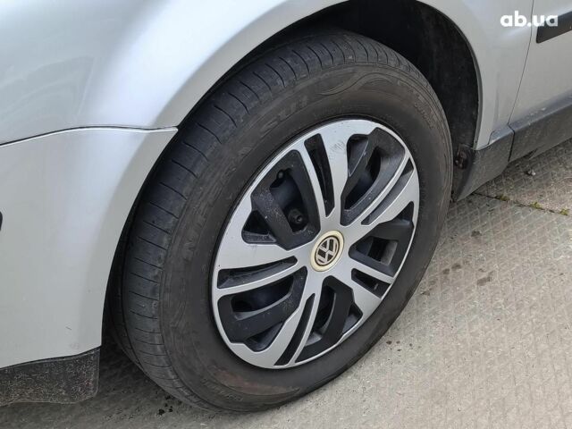 Серый Фольксваген Пассат, объемом двигателя 2 л и пробегом 299 тыс. км за 4690 $, фото 2 на Automoto.ua