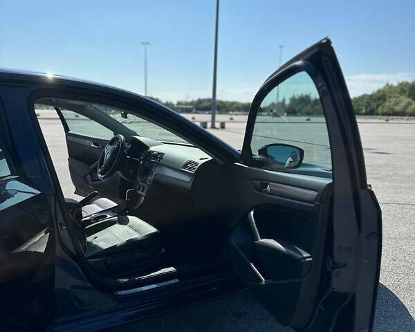 Синий Фольксваген Пассат, объемом двигателя 2 л и пробегом 195 тыс. км за 11500 $, фото 30 на Automoto.ua