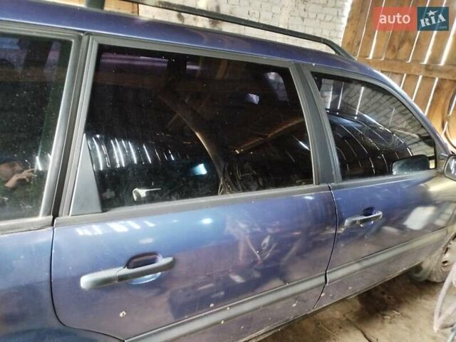 Синий Фольксваген Пассат, объемом двигателя 1.8 л и пробегом 411 тыс. км за 2200 $, фото 4 на Automoto.ua