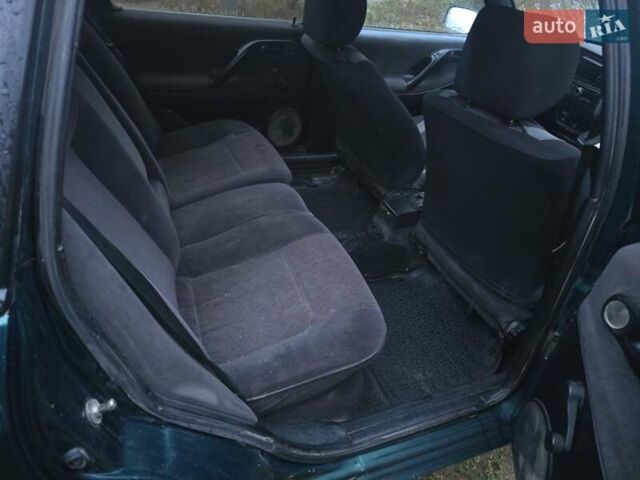 Зеленый Фольксваген Пассат, объемом двигателя 1.8 л и пробегом 528 тыс. км за 2200 $, фото 4 на Automoto.ua