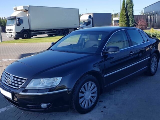 Черный Фольксваген Фаетон, объемом двигателя 3.2 л и пробегом 187 тыс. км за 10000 $, фото 1 на Automoto.ua